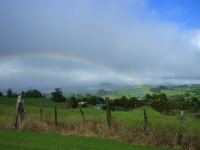 Landschaft mit Regenbogen